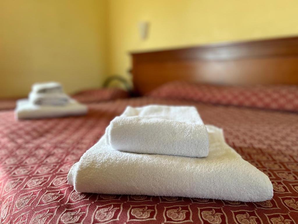 Postel nebo postele na pokoji v ubytování Costa Doro - Hotel