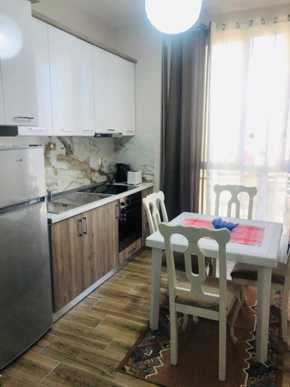 Kuchyň nebo kuchyňský kout v ubytování Rezidenca SHOPI Apartments
