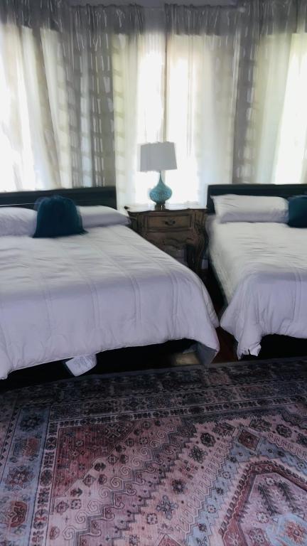 Postel nebo postele na pokoji v ubytování Sweet Sleep Inn