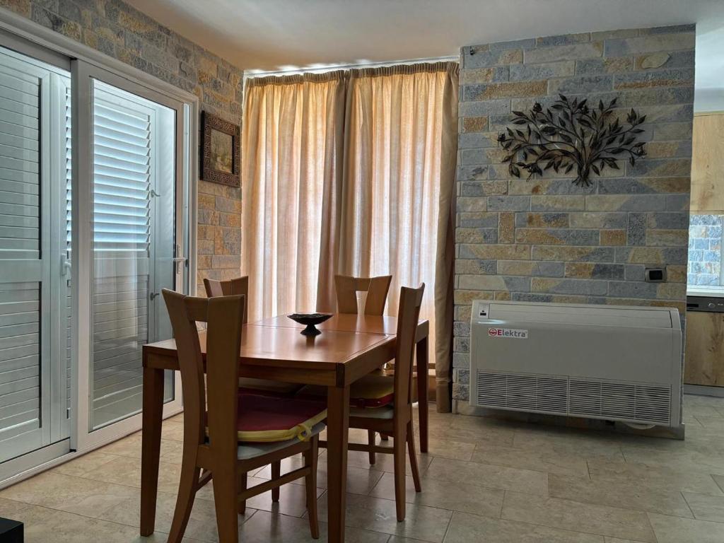 Posezení v ubytování Grand Resort by Greccia Dhermi Prime