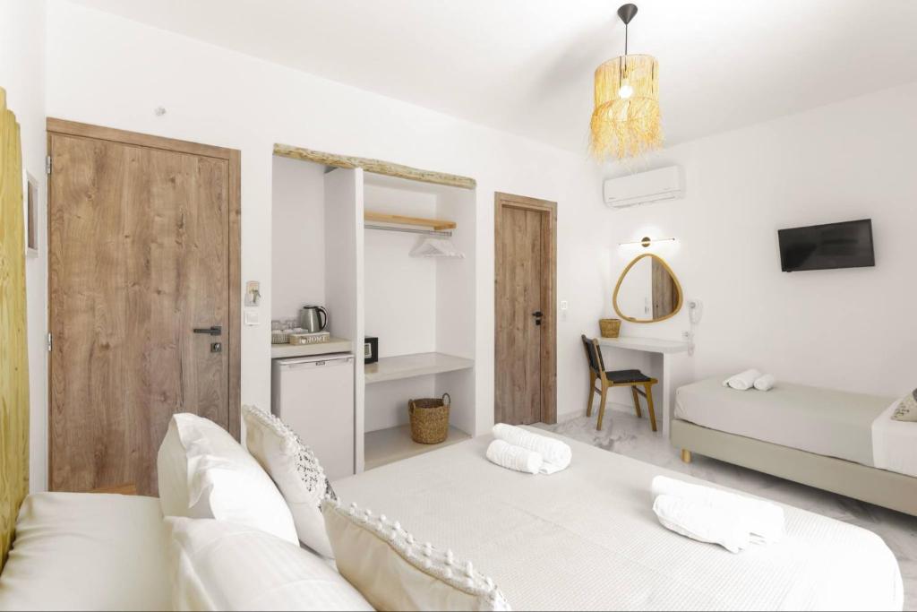 Postel nebo postele na pokoji v ubytování Athina Rooms - Lounge Apartments