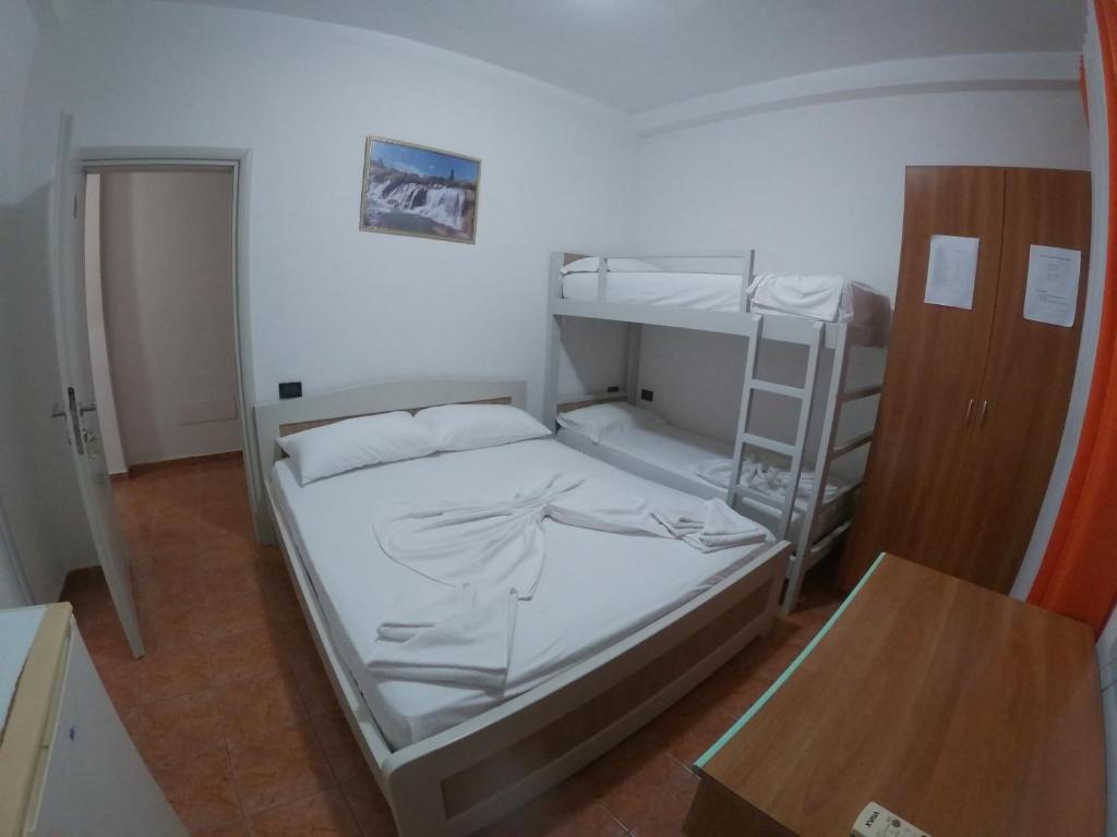 Postel nebo postele na pokoji v ubytování Hotel Bolonja