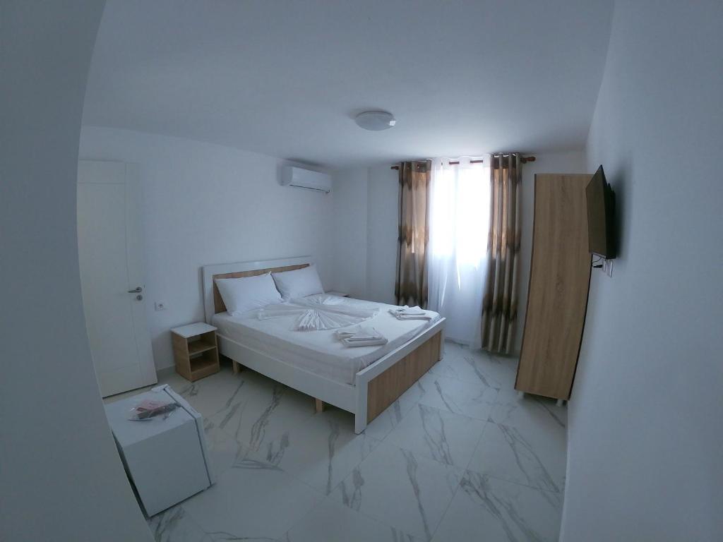 Postel nebo postele na pokoji v ubytování Hotel Bolonja