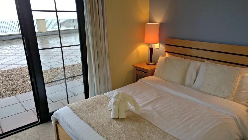 Postel nebo postele na pokoji v ubytování Pier Head Hotel Spa & Leisure