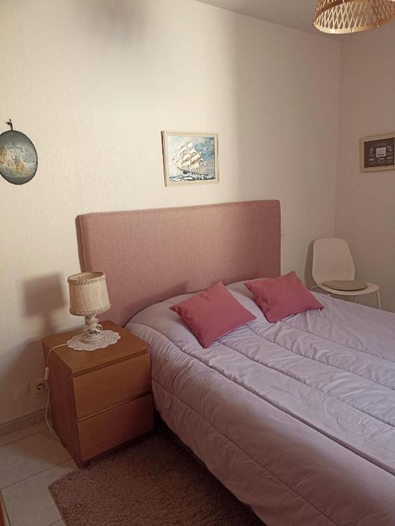 Postel nebo postele na pokoji v ubytování MAUGUIO-Carnon P2 60 m2, Tout confort, spacieux, CLIM, wifi, balcon, parking privé couvert, 15 min de la mer, de Montpellier