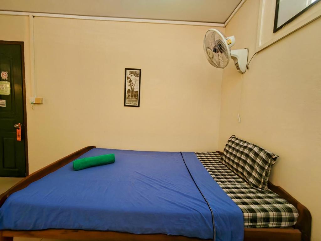Postel nebo postele na pokoji v ubytování Soben Cafe Guesthouse & Restaurant