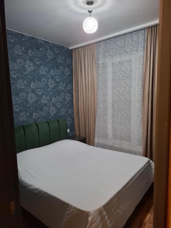 Postel nebo postele na pokoji v ubytování Sea