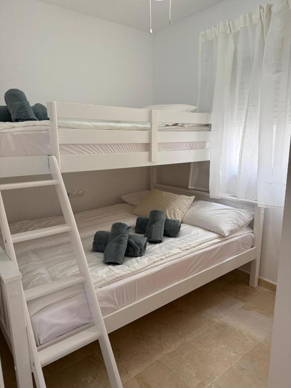 Postel nebo postele na pokoji v ubytování 1B Barabas