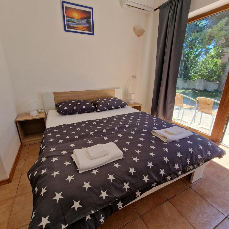 Postel nebo postele na pokoji v ubytování D&D Rooms