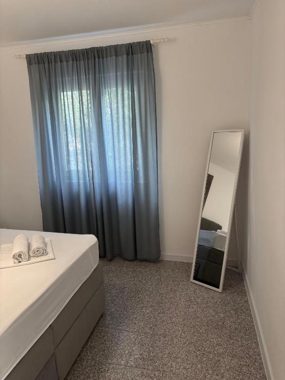 Posteľ alebo postele v izbe v ubytovaní Apartments Sini