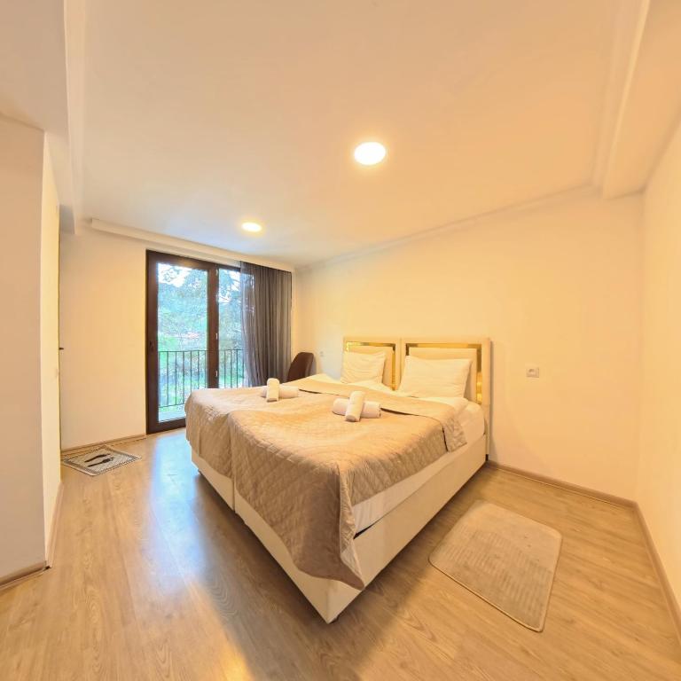 Postel nebo postele na pokoji v ubytování Shara Hotel