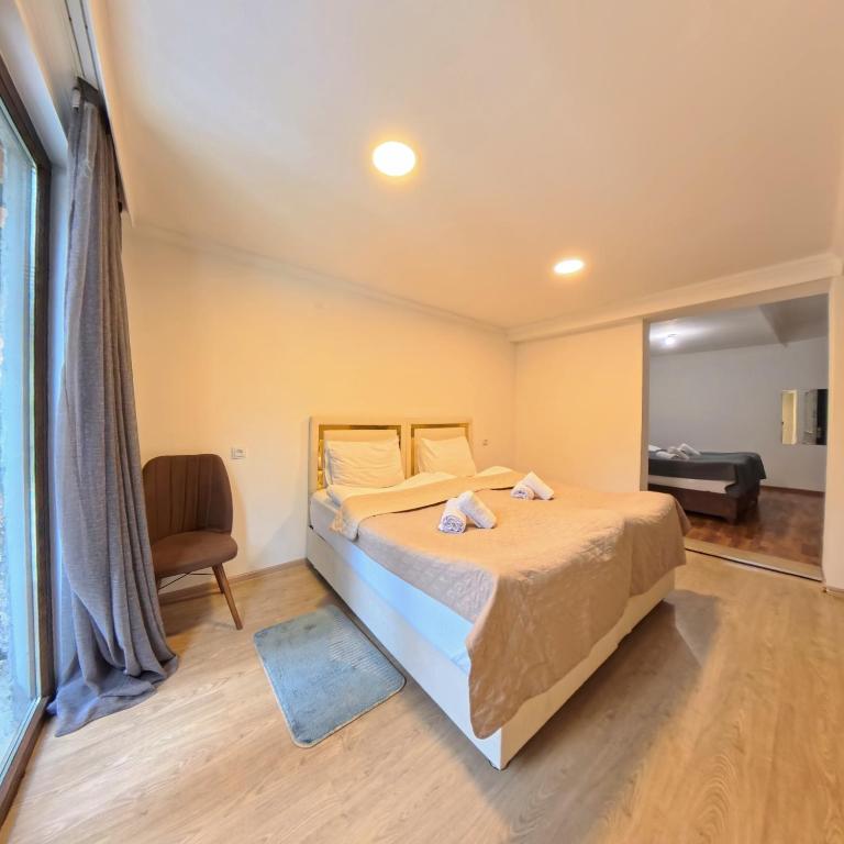 Postel nebo postele na pokoji v ubytování Shara Hotel