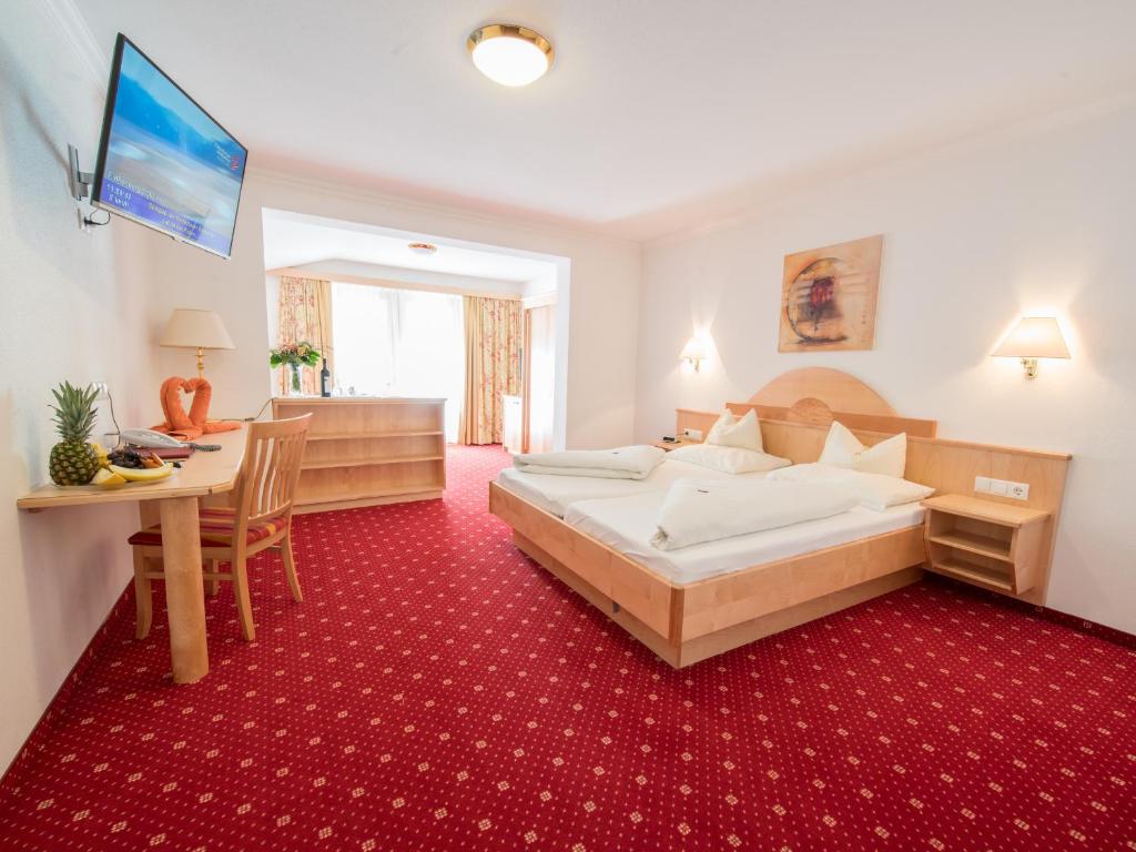 Postel nebo postele na pokoji v ubytování Superior Hotel Persal