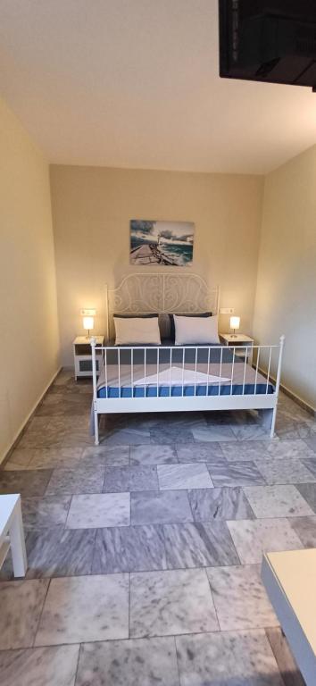 Postel nebo postele na pokoji v ubytování Villa Kavourakia