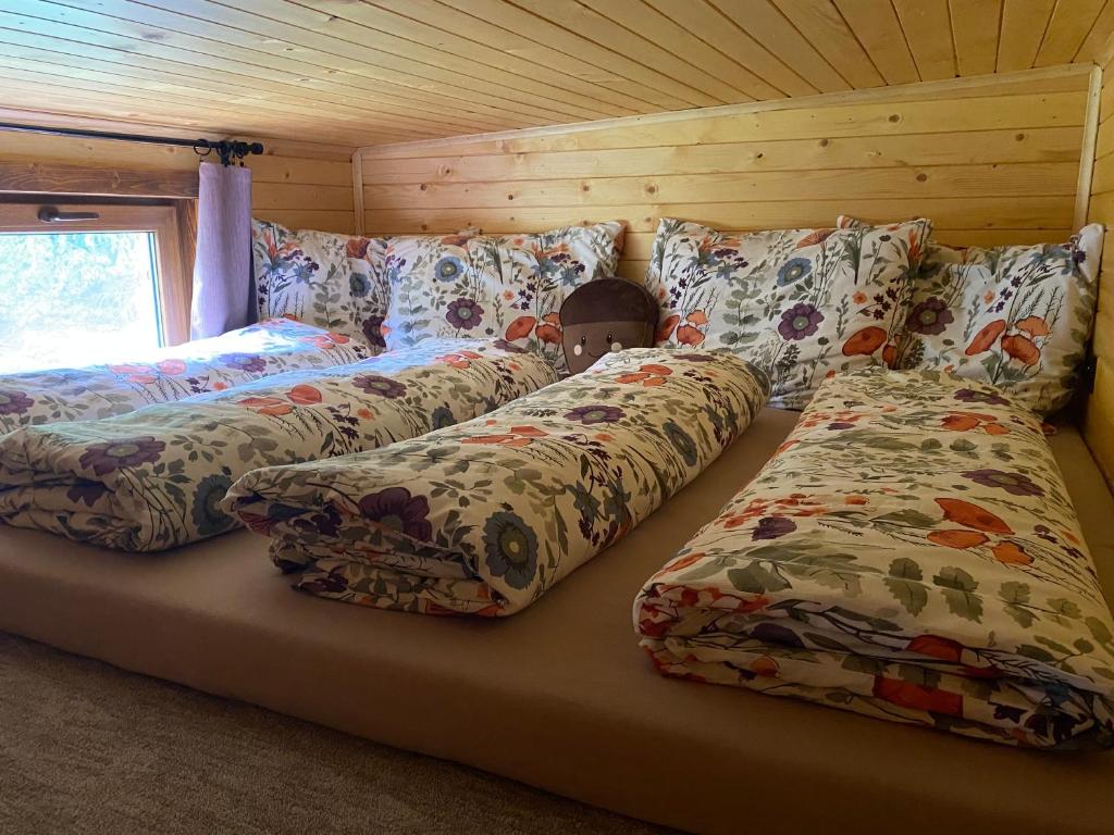 Postel nebo postele na pokoji v ubytování koliBka - tiny house