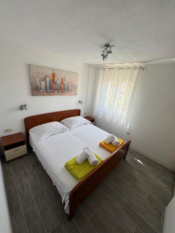 Postel nebo postele na pokoji v ubytování Hvar Apartments Felix