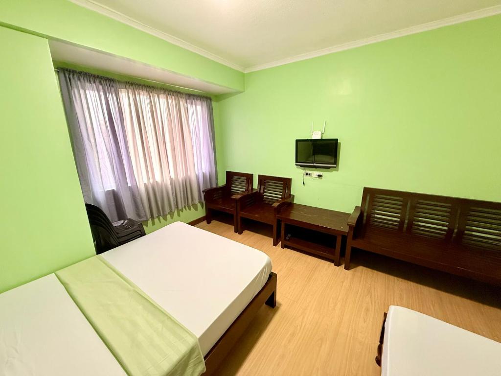TV a/nebo společenská místnost v ubytování Albergo Hotel - Studio Condo Unit - Baguio Transient