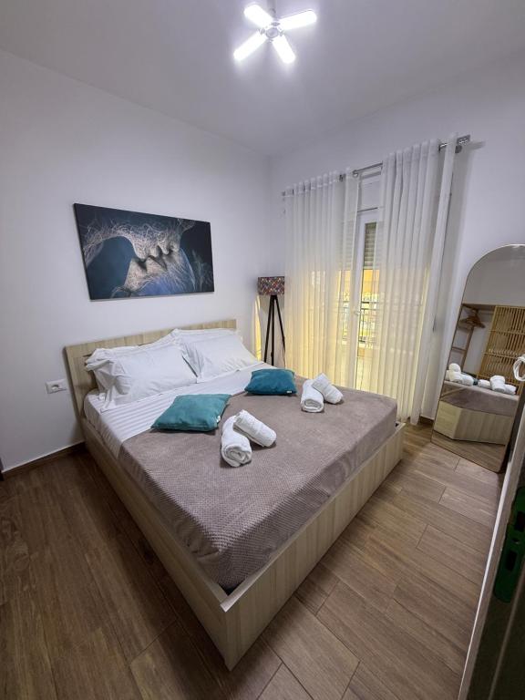 Voodi või voodid majutusasutuse Luka Apartment in Sarande toas
