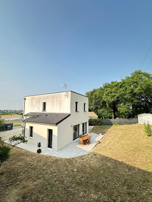 an aerial view of a white house at La Bulle Familiale in Angoulême