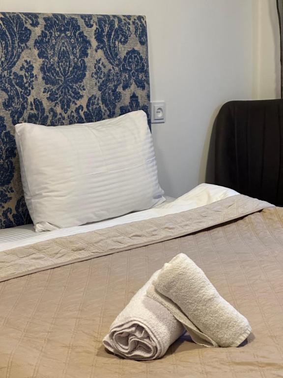 Postel nebo postele na pokoji v ubytování Shara Hotel