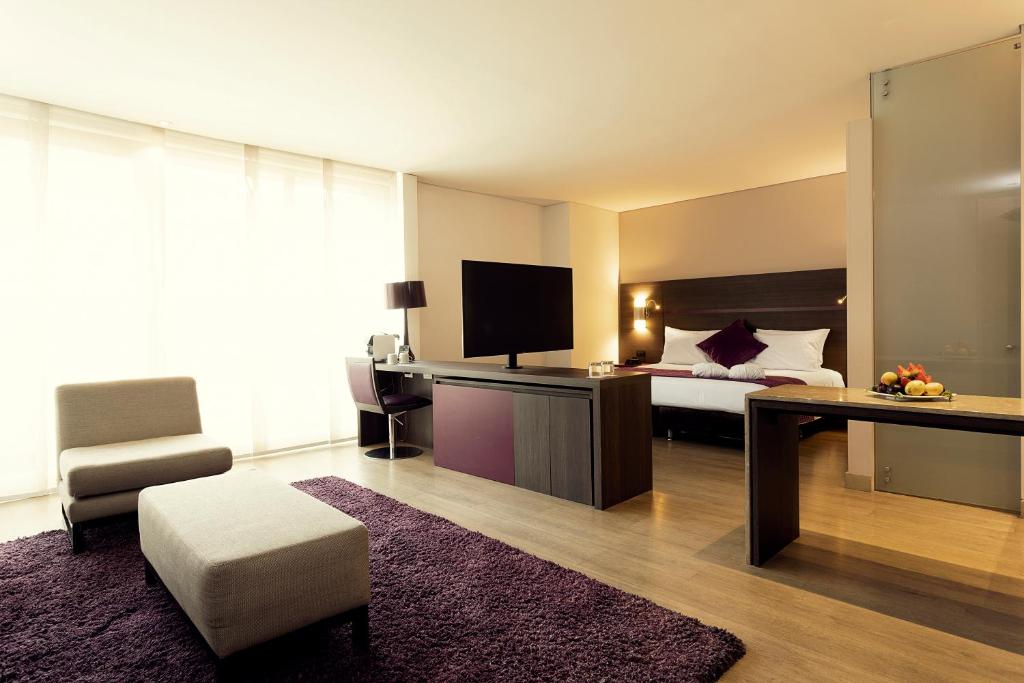 Postel nebo postele na pokoji v ubytování Mercure Bogota BH Zona Financiera