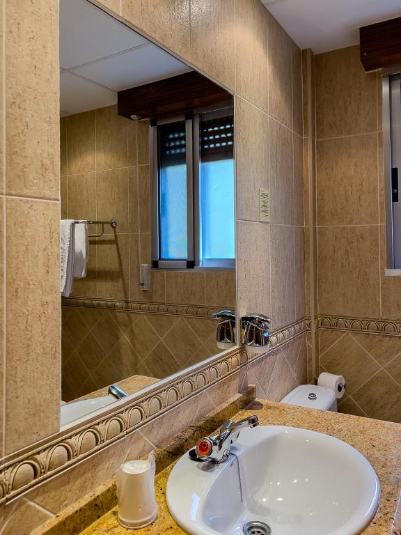 Koupelna v ubytování Hotel Don Pepe Lago de Sanabria
