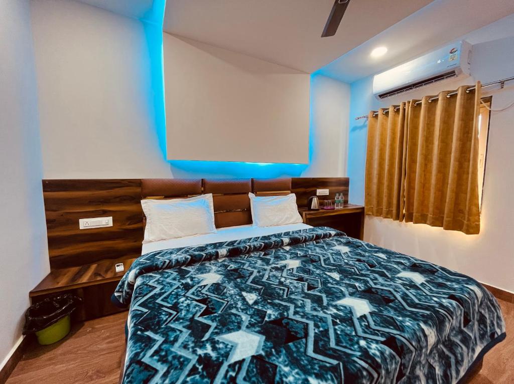 Postel nebo postele na pokoji v ubytování Manya Palace