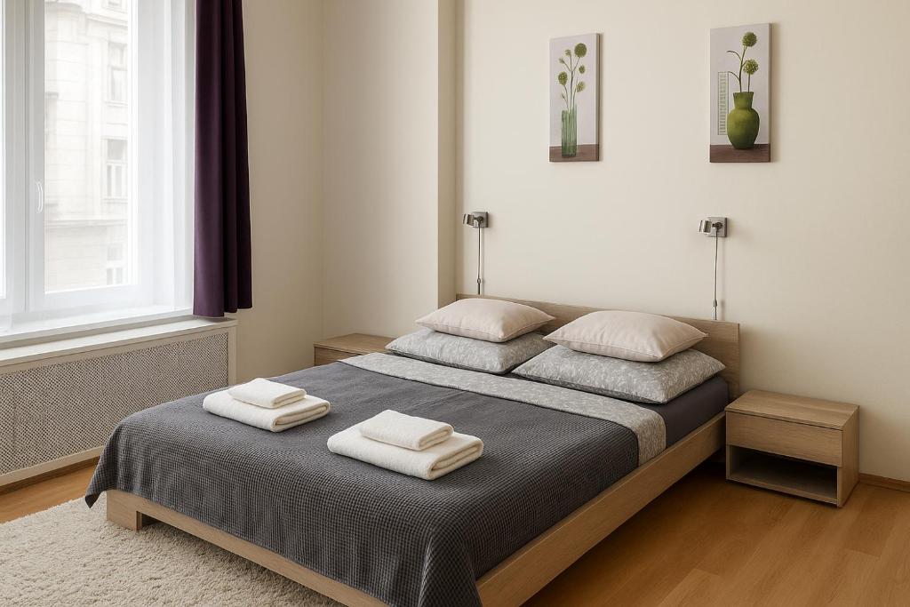 Posteľ alebo postele v izbe v ubytovaní Andy's Home Central Apatment