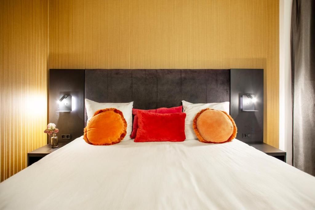 Postel nebo postele na pokoji v ubytování Hotel Lowietje Lisse - Keukenhof