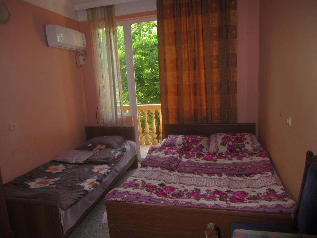 Postel nebo postele na pokoji v ubytování HOTEL - SHORENA