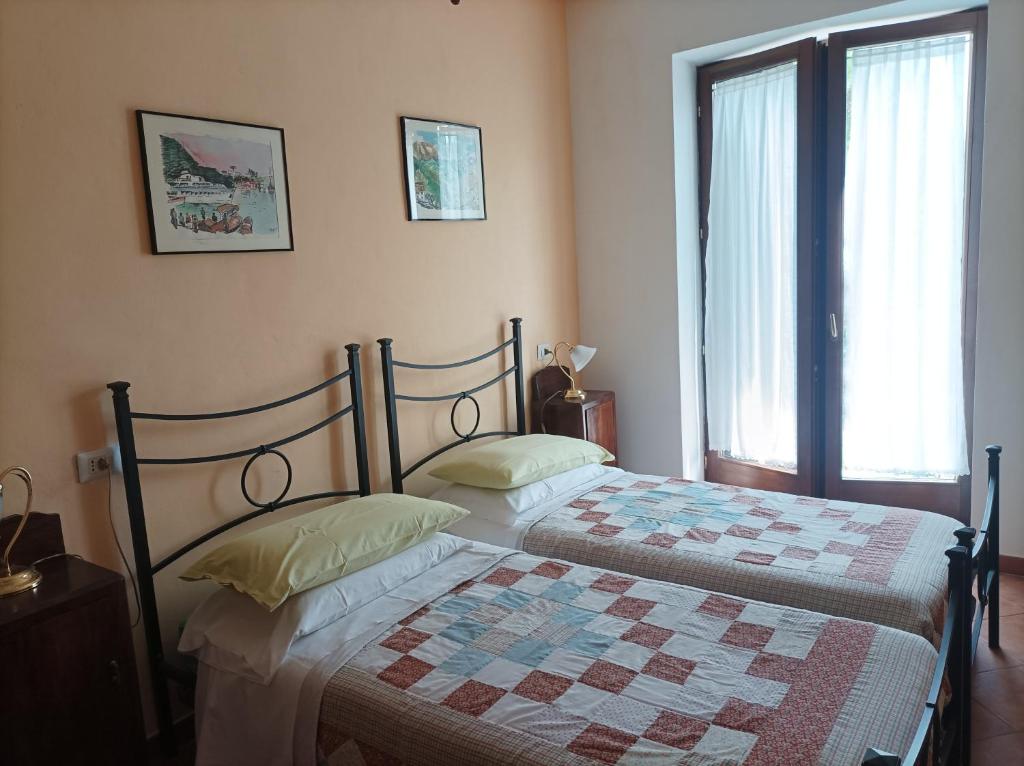 Postel nebo postele na pokoji v ubytování Bed and Breakfast da Pio