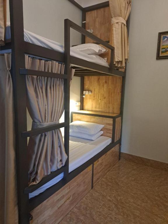 Postel nebo postele na pokoji v ubytování Tam Coc Guest House & Hostel