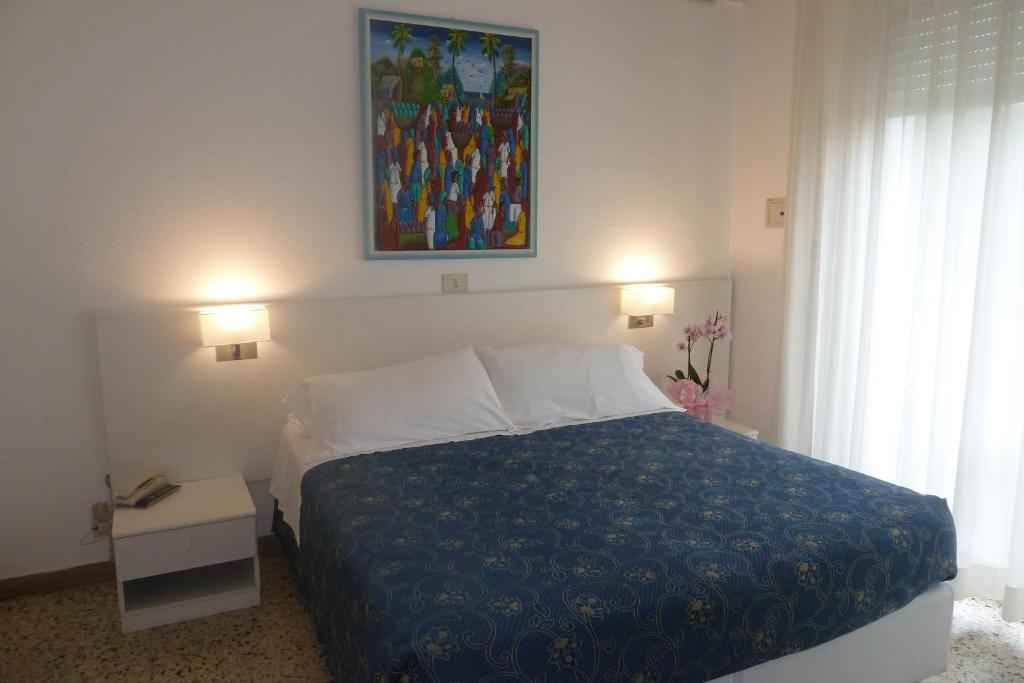Postel nebo postele na pokoji v ubytování Hotel Astra