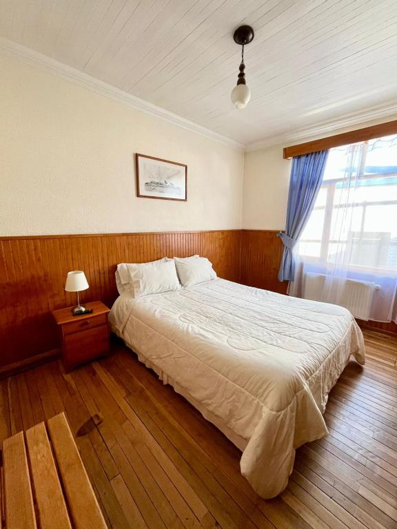 Postel nebo postele na pokoji v ubytování CHALET CHAPITAL Punta Arenas