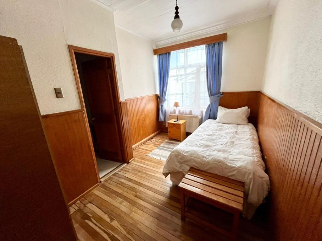 Postel nebo postele na pokoji v ubytování CHALET CHAPITAL Punta Arenas