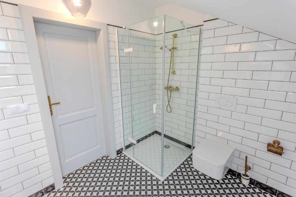 Koupelna v ubytování Apartmány U Devíti Lvů