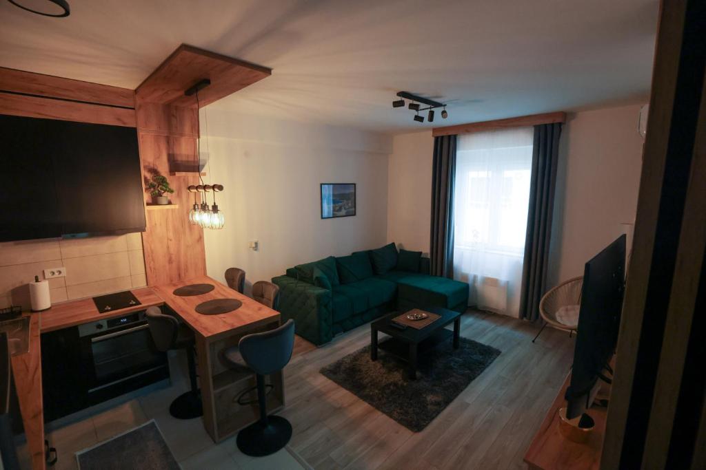 TV a/nebo společenská místnost v ubytování Zeus Apartman