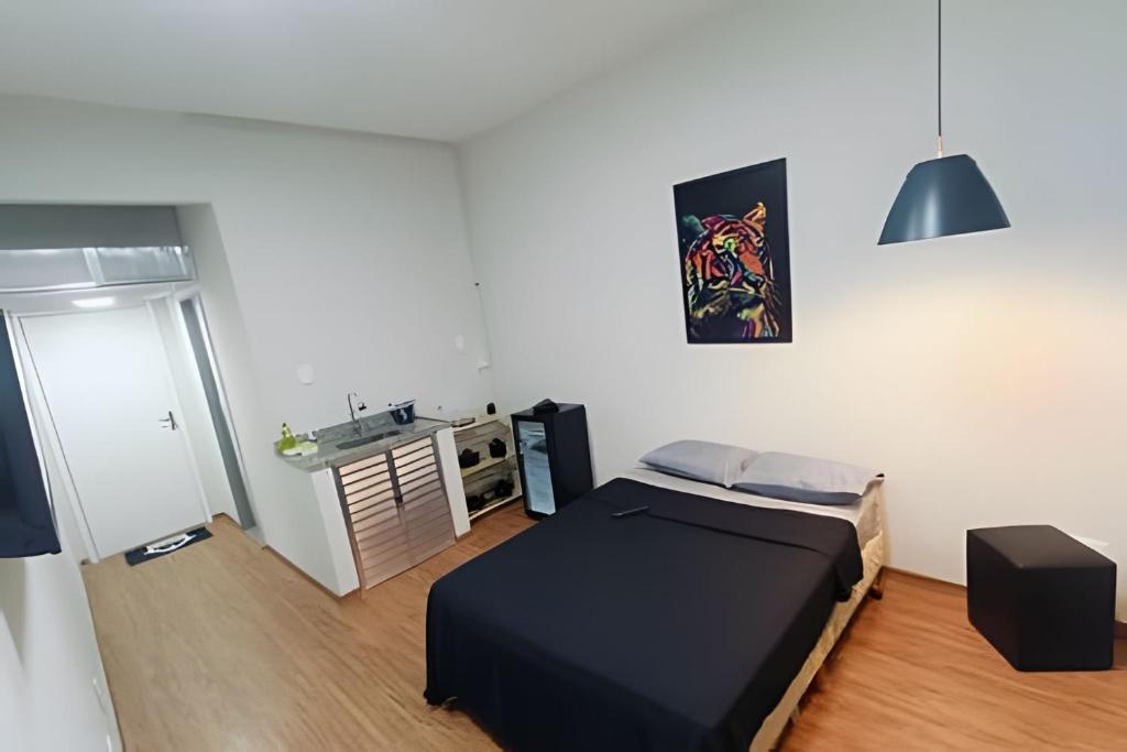 En eller flere senge i et værelse på Studio Prime - Centro Niterói 704 (Sem Ar)