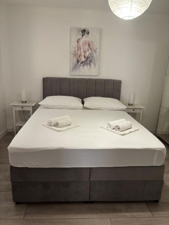 Posteľ alebo postele v izbe v ubytovaní Apartments Sini