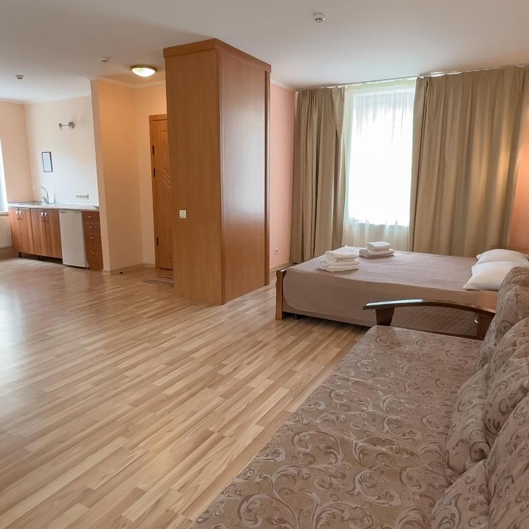 Postel nebo postele na pokoji v ubytování Panna Hotel