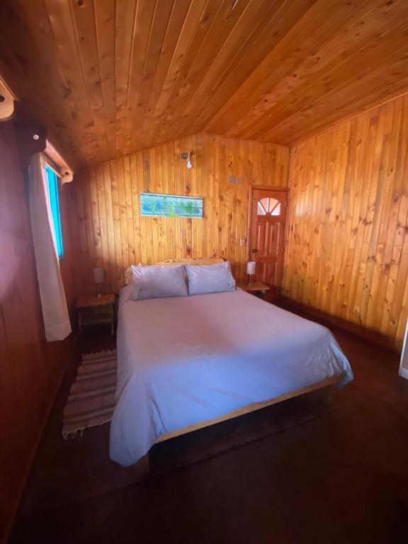 Uma cama ou camas num quarto em Hostel Raíz
