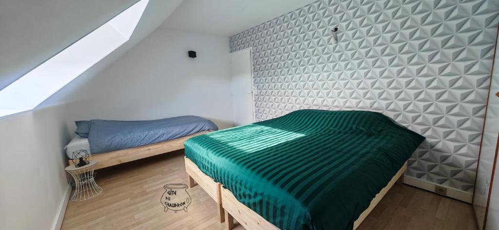 Postel nebo postele na pokoji v ubytování Gîte du Chaudron