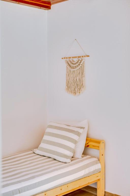 Postel nebo postele na pokoji v ubytování Casa Ramiro II Escapadinha na Ilha da Culatra