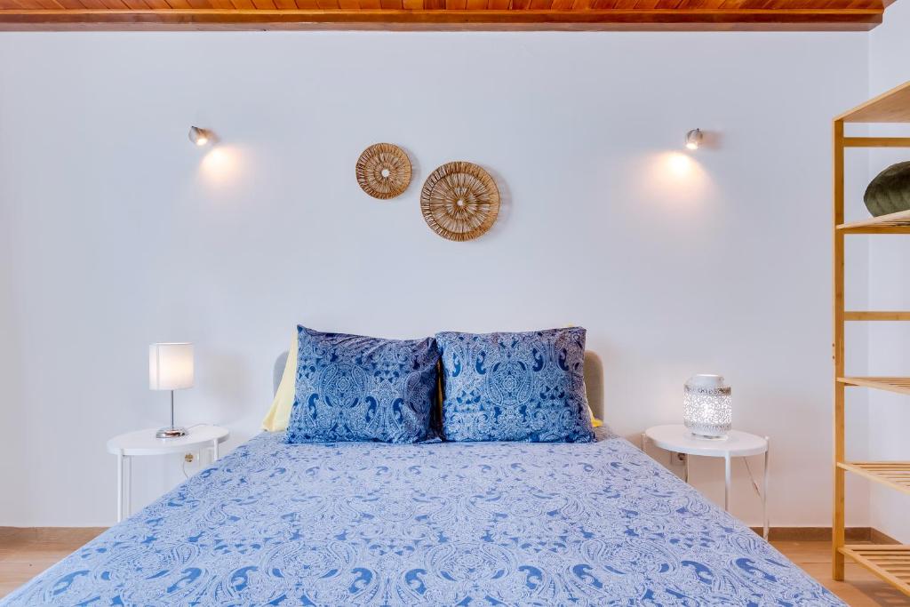 Postel nebo postele na pokoji v ubytování Casa Ramiro II Escapadinha na Ilha da Culatra