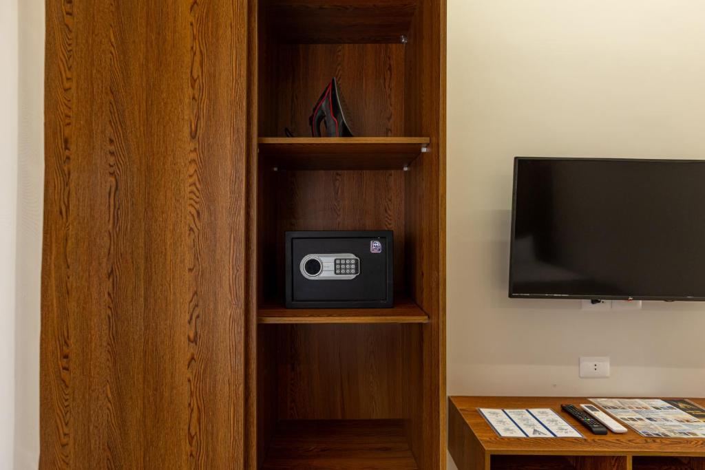 TV a/nebo společenská místnost v ubytování East Pyramids View Hotel