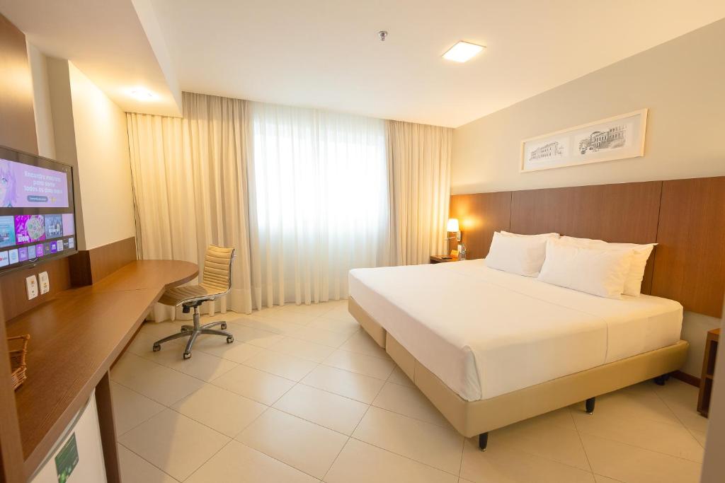 Postel nebo postele na pokoji v ubytování Quality Hotel Vitória