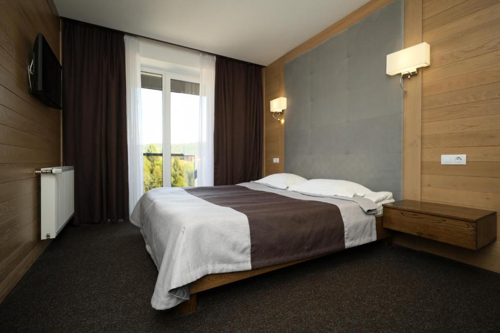 Postel nebo postele na pokoji v ubytování VILSON hotel