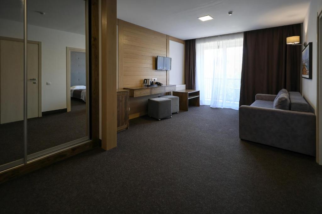 TV a/nebo společenská místnost v ubytování VILSON hotel