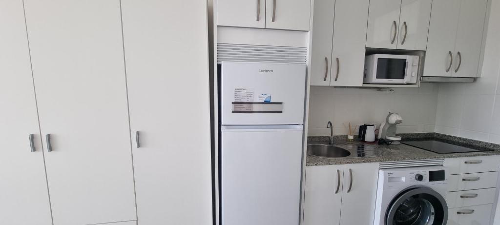 Kuchyňa alebo kuchynka v ubytovaní Tropicana playa