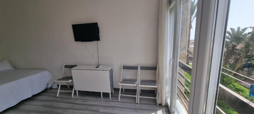 Posteľ alebo postele v izbe v ubytovaní Tropicana playa